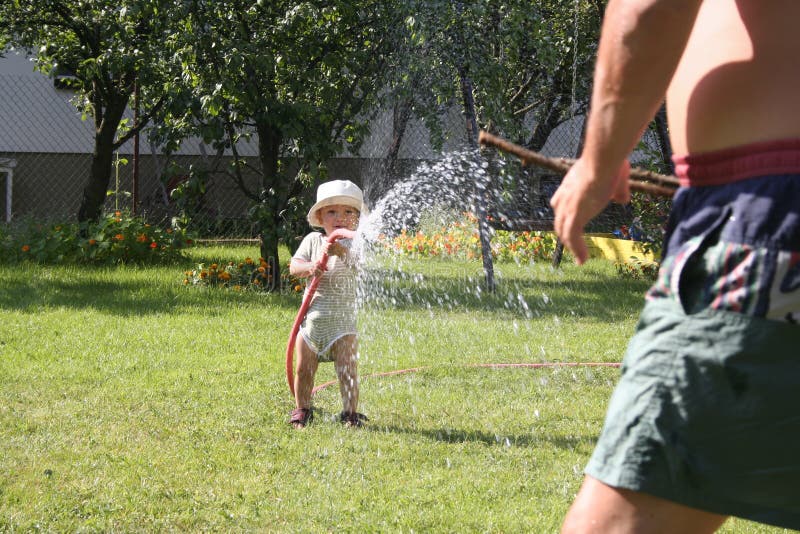 Pouring grandfather boy. Pouring grandfather boy