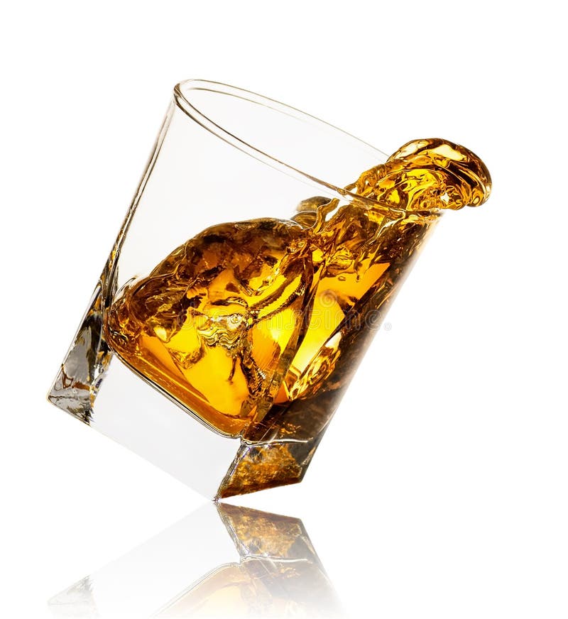 Splash in glass of whiskey and ice isolated, Stock image