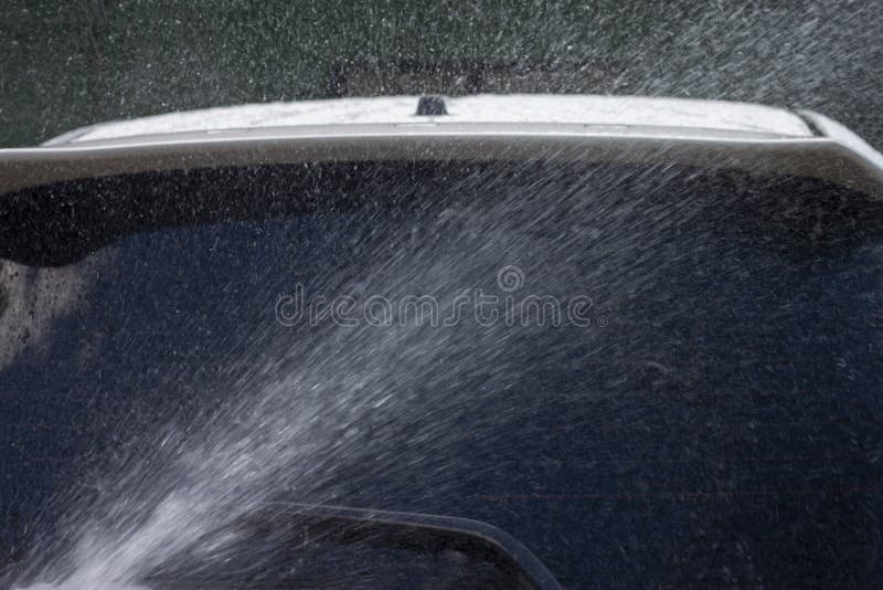 Splashes of Water from the Car Wash at the Garage. Stock Image Image