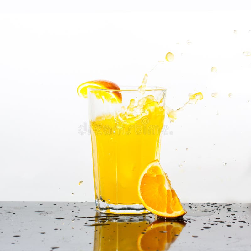 Splashing drink stock image. Image of health, orange 35877149