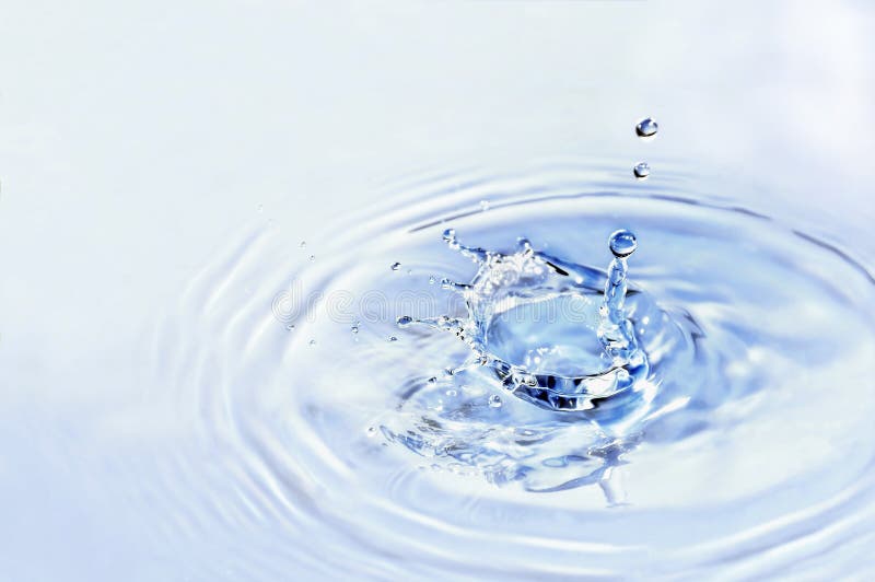 Splashing water drops royalty free stock photography