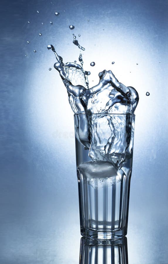 Splashing Water Of Ice In A Cool Glass Of Water Stock Image Image of