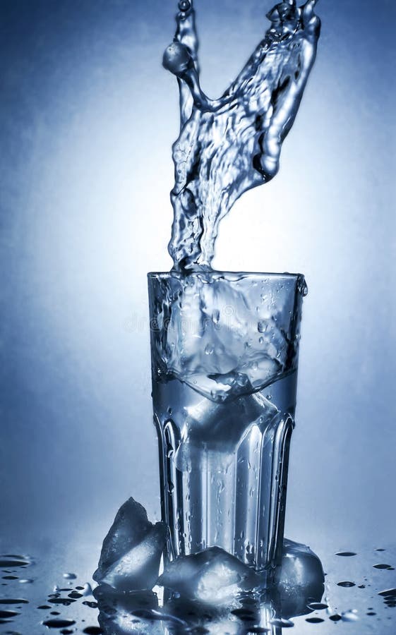Splashing Water Of Ice In A Cool Glass Of Water Stock Photo Image of