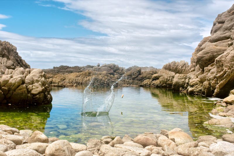 Splashing water with a rock