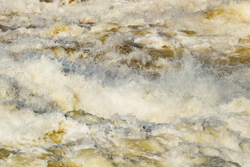 Splashing water waves on the fast river stock images