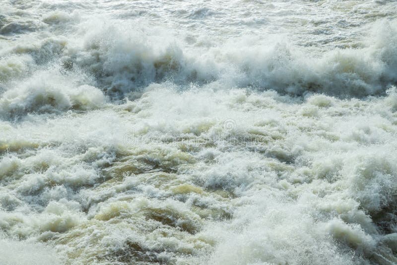 Splashing water waves on the spring fast river royalty free stock photography