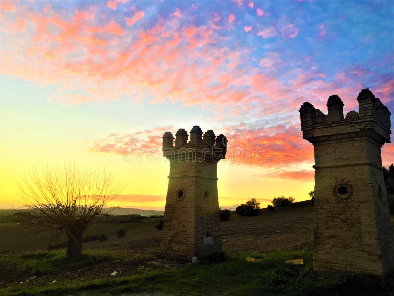 Splendid landscape, enchanting nature, fairytale, sunset, colours, towers and hills in Marche region, Italy