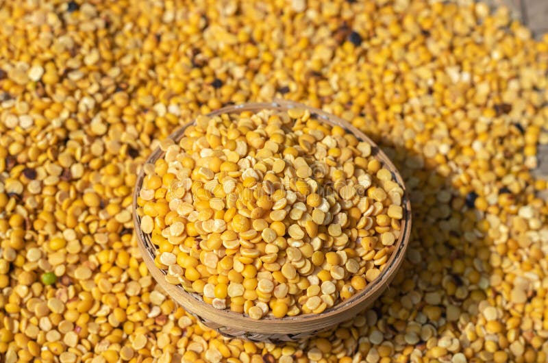 Split Pigeon Pea in Bamboo Bowl from Top Angle at Day Stock Image