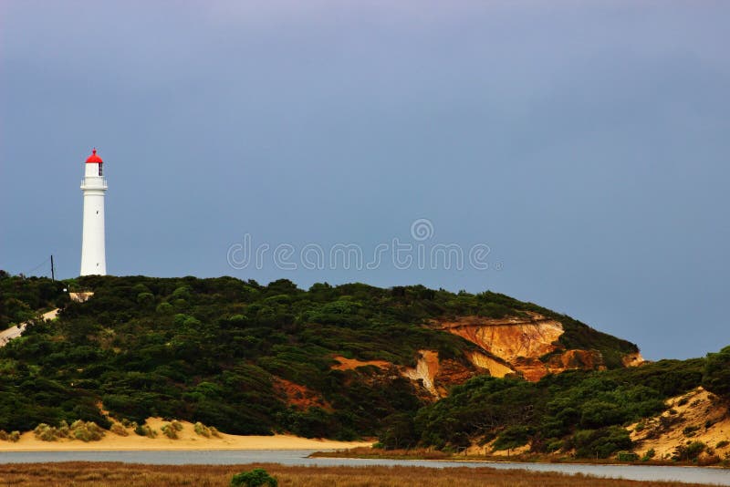 Split point lighthouse with the bush stock photos