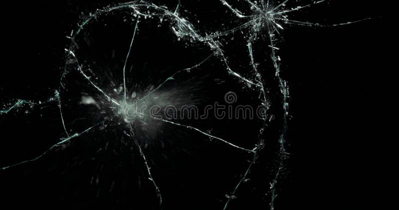 Broken cracks glass fracture effect texture isolated abstract black background. Bullet cracked window with big hole screen mirror weapon shot. Broken cracks glass fracture effect texture isolated abstract black background. Bullet cracked window with big hole screen mirror weapon shot.