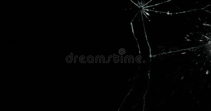 Broken cracks glass fracture effect texture isolated abstract black background. Bullet cracked window with big hole screen mirror weapon shot. Broken cracks glass fracture effect texture isolated abstract black background. Bullet cracked window with big hole screen mirror weapon shot.