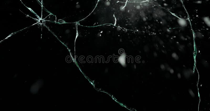 Broken cracks glass fracture effect texture isolated abstract black background. Bullet cracked window with big hole screen mirror weapon shot. Broken cracks glass fracture effect texture isolated abstract black background. Bullet cracked window with big hole screen mirror weapon shot.