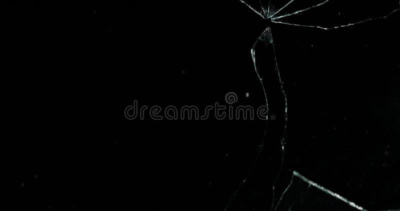 Broken cracks glass fracture effect texture isolated abstract black background. Bullet cracked window with big hole screen mirror weapon shot. Broken cracks glass fracture effect texture isolated abstract black background. Bullet cracked window with big hole screen mirror weapon shot.