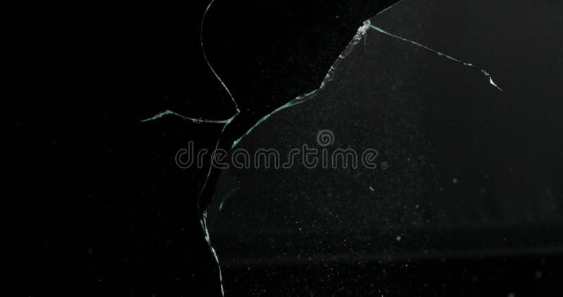 Broken cracks glass fracture effect texture isolated abstract black background. Bullet cracked window with big hole screen mirror weapon shot. Broken cracks glass fracture effect texture isolated abstract black background. Bullet cracked window with big hole screen mirror weapon shot.