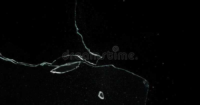 Broken cracks glass fracture effect texture isolated abstract black background. Bullet cracked window with big hole screen mirror weapon shot. Broken cracks glass fracture effect texture isolated abstract black background. Bullet cracked window with big hole screen mirror weapon shot.