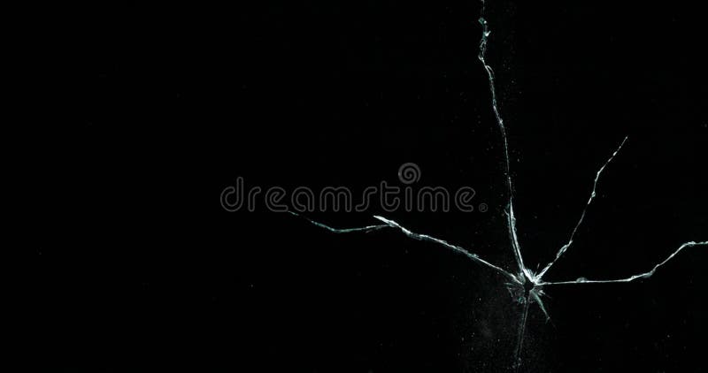 Broken cracks glass fracture effect texture isolated abstract black background. Bullet cracked window with big hole screen mirror weapon shot. Broken cracks glass fracture effect texture isolated abstract black background. Bullet cracked window with big hole screen mirror weapon shot.