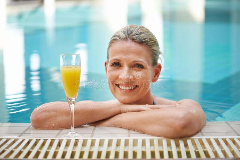 Spoiling Myself Today Portrait Of A Mature Woman Enjoying A Glass Of