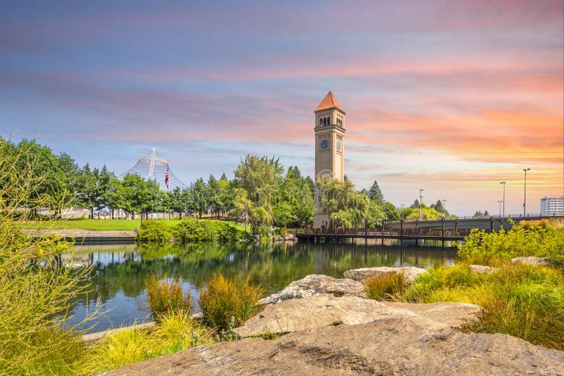 The Spokane Clock Tower and Pavilion along the river in Riverfront Park, Spokane Washington. stock photo The Spokane Clock Tower and Pavilion along the river in Riverfront Park, Spokane Washington. stock photo