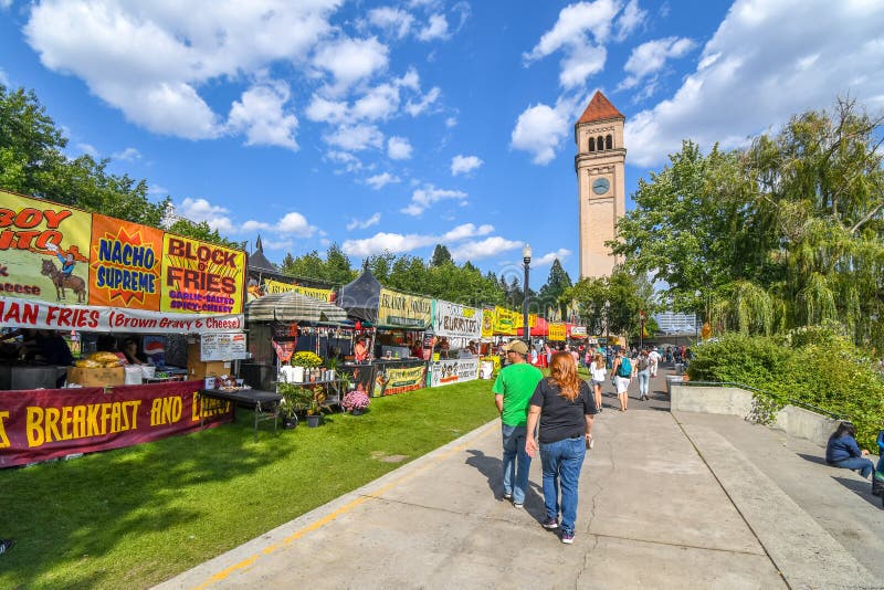Tourists enjoy food stalls and booths at the annual Pig out in the Park Festival in Spokane, Washington stock image Tourists enjoy food stalls and booths at the annual Pig out in the Park Festival in Spokane, Washington stock image