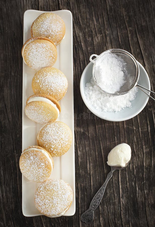 Sponge kisses with cream stock photo. Image of cake, food 37686596