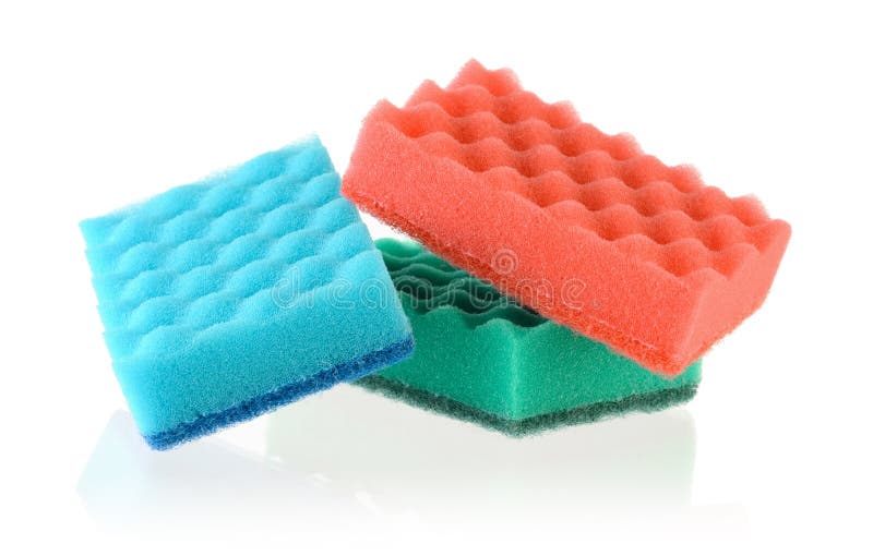 Multi-colored sponges for dishes isolated on white background. Multi colored foam sponges stock images, royalty-free photos and pictures