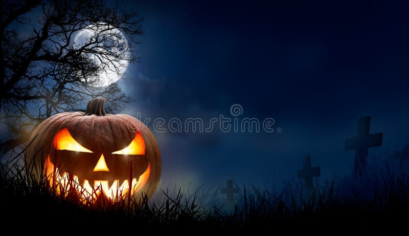 A spooky halloween pumpkin, Jack O Lantern, with an evil face and eyes