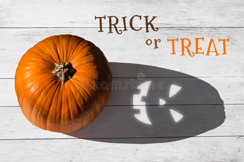 Spooky shadow with text trick or treat top view