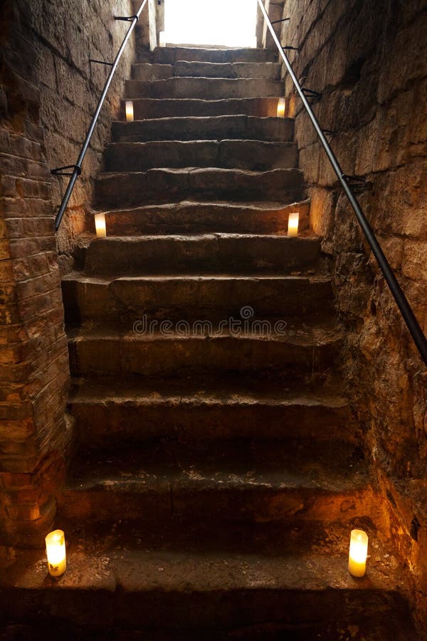 Spooky stone stairs in old castle