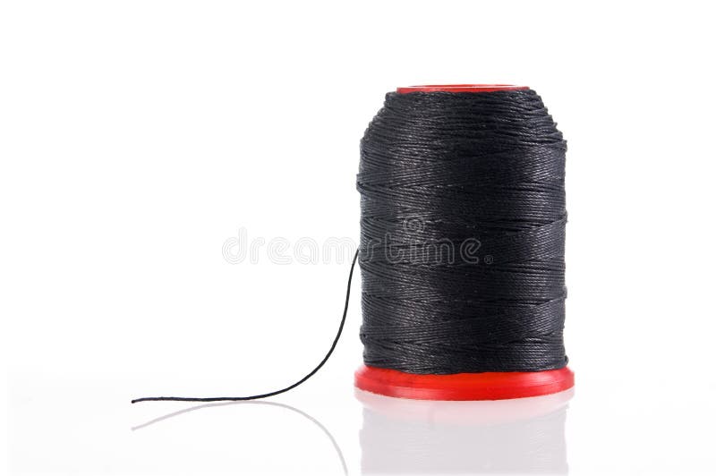 Black Thread With A Needle And A Spool Of Threads On A White Background  Stock Photo, Picture and Royalty Free Image. Image 99466912.