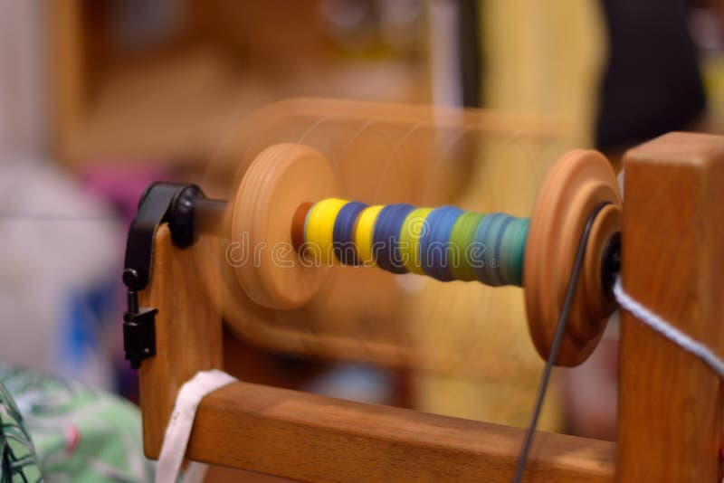 Spool of a spinning wheel in motion