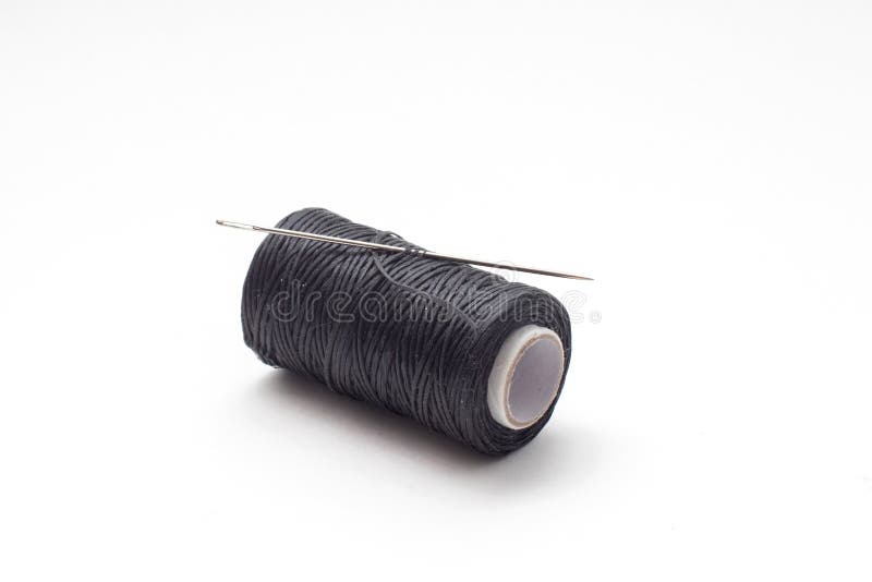 Spool of Waxed Black Sewing Threads with Neadle. Stock Photo Image of