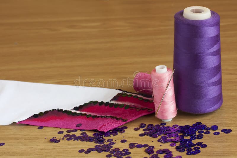Spools Thread And Fabric With Embroidery Stock Image - Image of pink