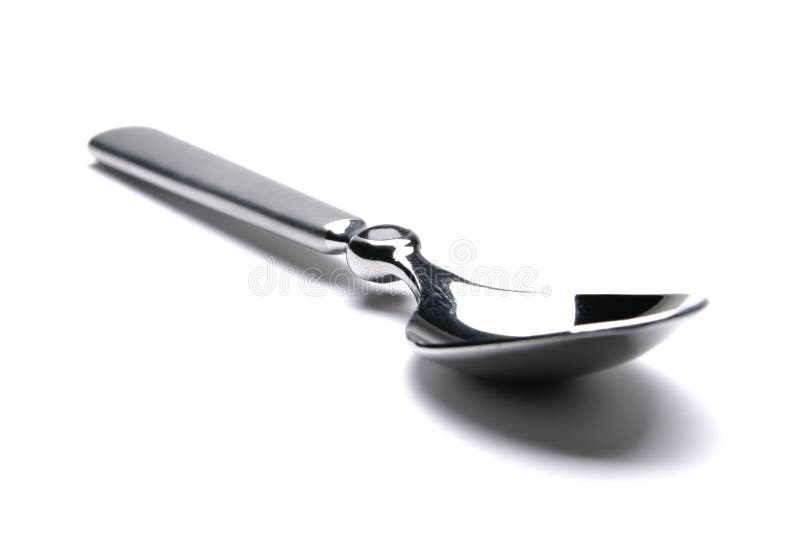 Single silver spoon on a white background.