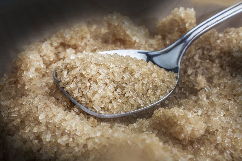 Spoon Full of Brown Sugar Over Pile Stock Photo - Image of candy ...