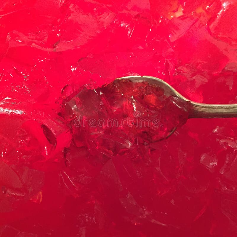 Spoon full red jello stock photo. Image of strawberry 52575592