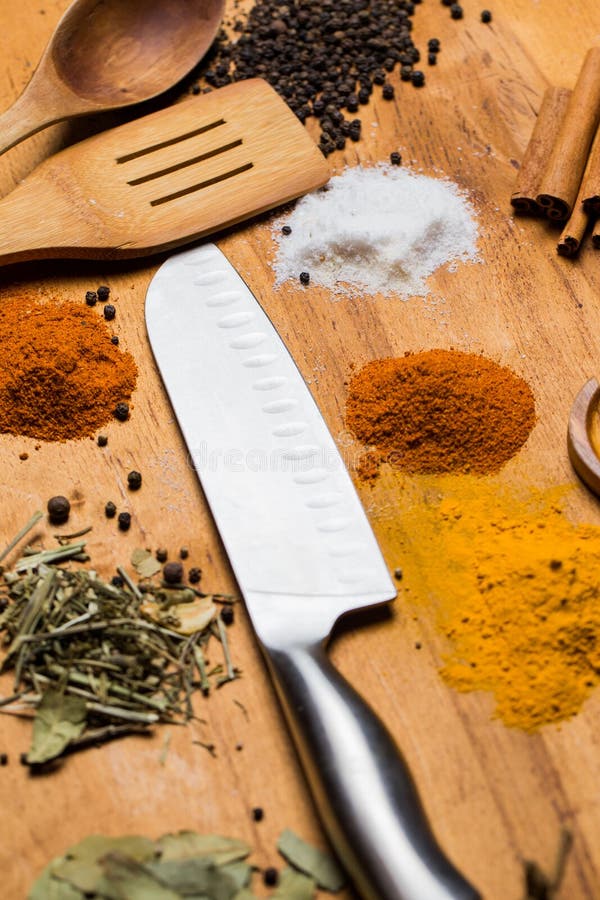 Spoon, Knife and Heap of Spices on the Table Stock Photo Image of
