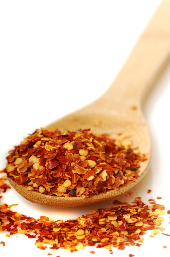 Spoon of red pepper flakes