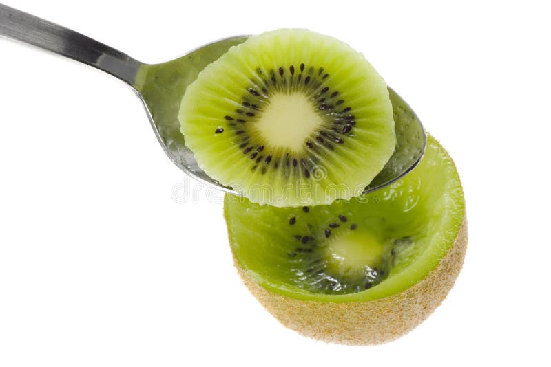 Spoon scooping kiwifruit