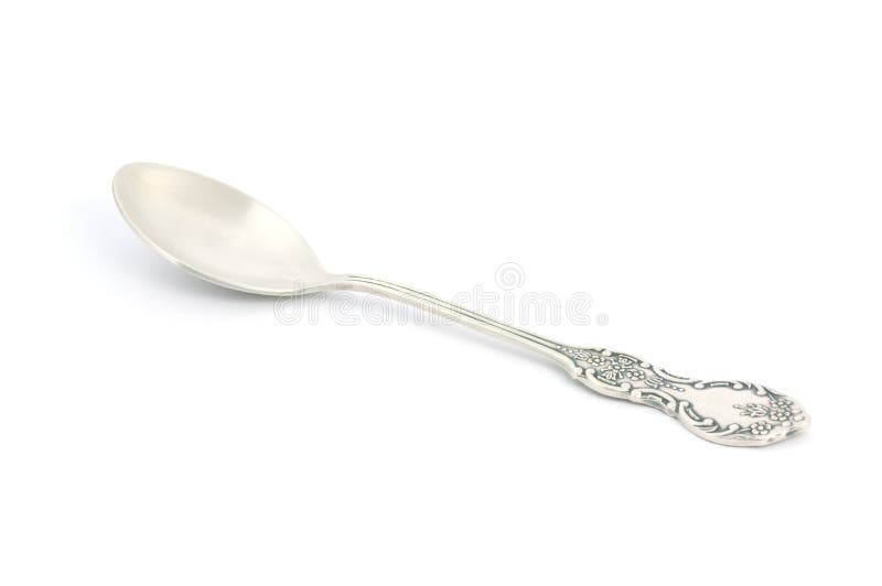 Antique silver spoon isolated on white. Antique silver spoon isolated on white