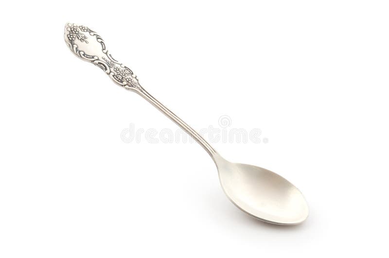 Antique silver spoon isolated on white. Antique silver spoon isolated on white