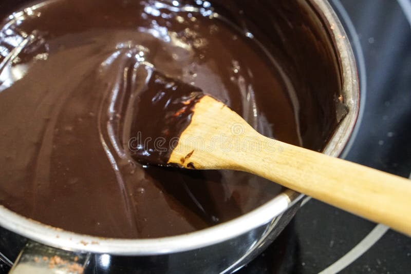 Stirred Melting Chocolate In A Pot Over Stove Stock Image Image of