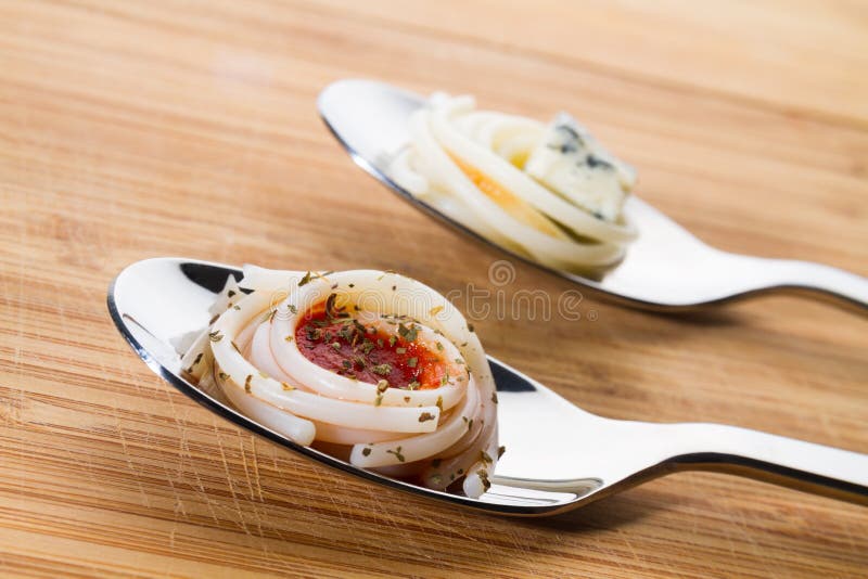 Spoons with spaghetti stock photo. Image of tomato, wood 29668524
