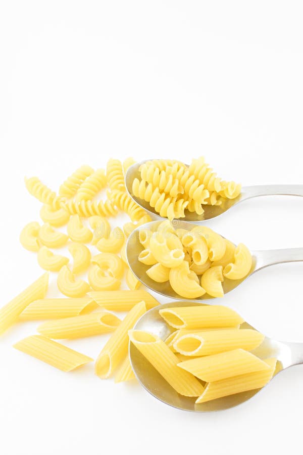 Spoons With Spaghetti Noodles. Stock Photo Image of isolated, gourmet