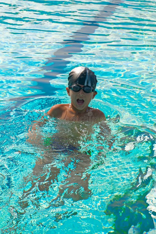 Sport Activities on the Pool, Boy Swimming in Water, Summertime Stock