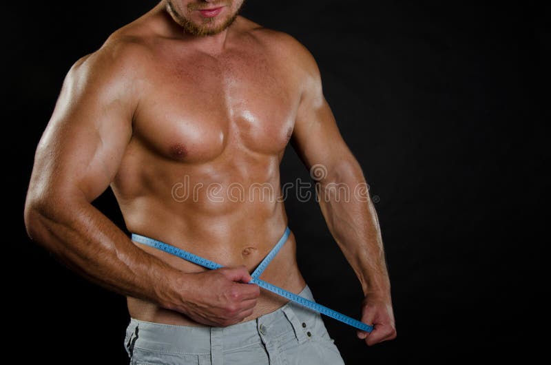 Sport en dieet Aantrekkelijke mens met spierlichaam royalty-vrije stock afbeelding Sport en dieet Aantrekkelijke mens met spierlichaam royalty-vrije stock afbeelding