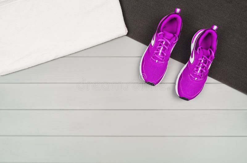 Sport fitness accessories on wooden background mock up, top view royalty free stock photography Sport fitness accessories on wooden background mock up, top view royalty free stock photography