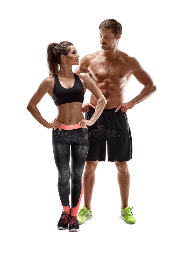 Sport, fitness, trainingconcept Geschikt paar, sterke spierman en het slanke vrouw stellen op een witte achtergrond royalty-vrije stock fotografie Sport, fitness, trainingconcept Geschikt paar, sterke spierman en het slanke vrouw stellen op een witte achtergrond royalty-vrije stock fotografie