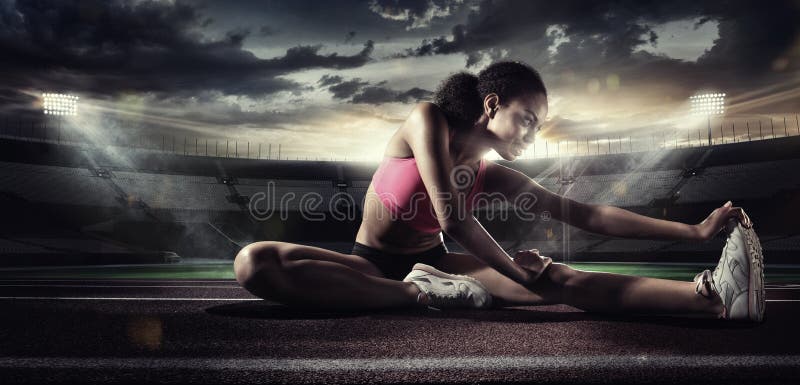 sport Läufer, der auf die Laufbahn ausdehnt stockfotos sport Läufer, der auf die Laufbahn ausdehnt stockfotos