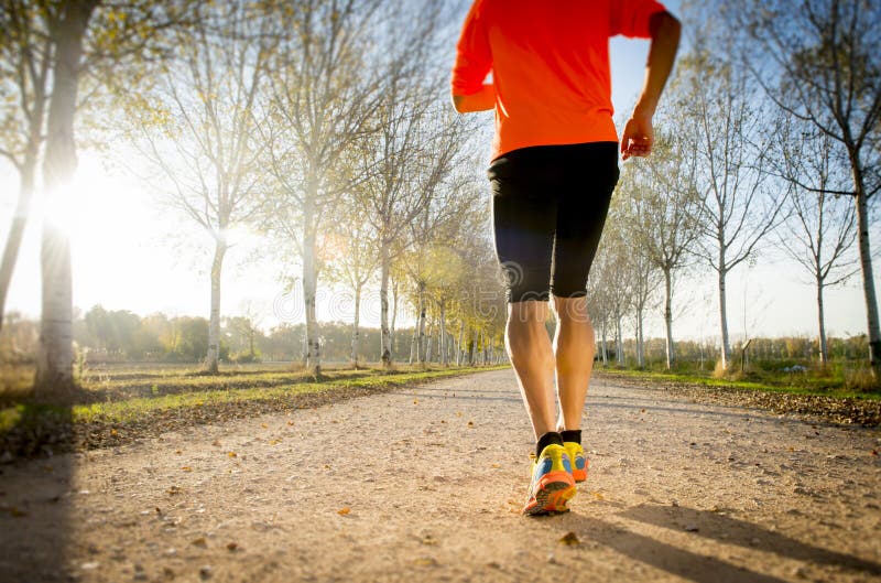 Sport Man with Strong Calves Muscle Running Outdoors in Off Road Trail ...