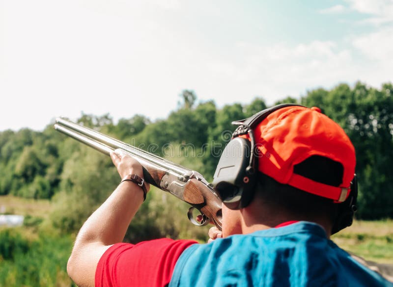 Sport shooting plates shotgun man aiming stock images Sport shooting plates shotgun man aiming stock images